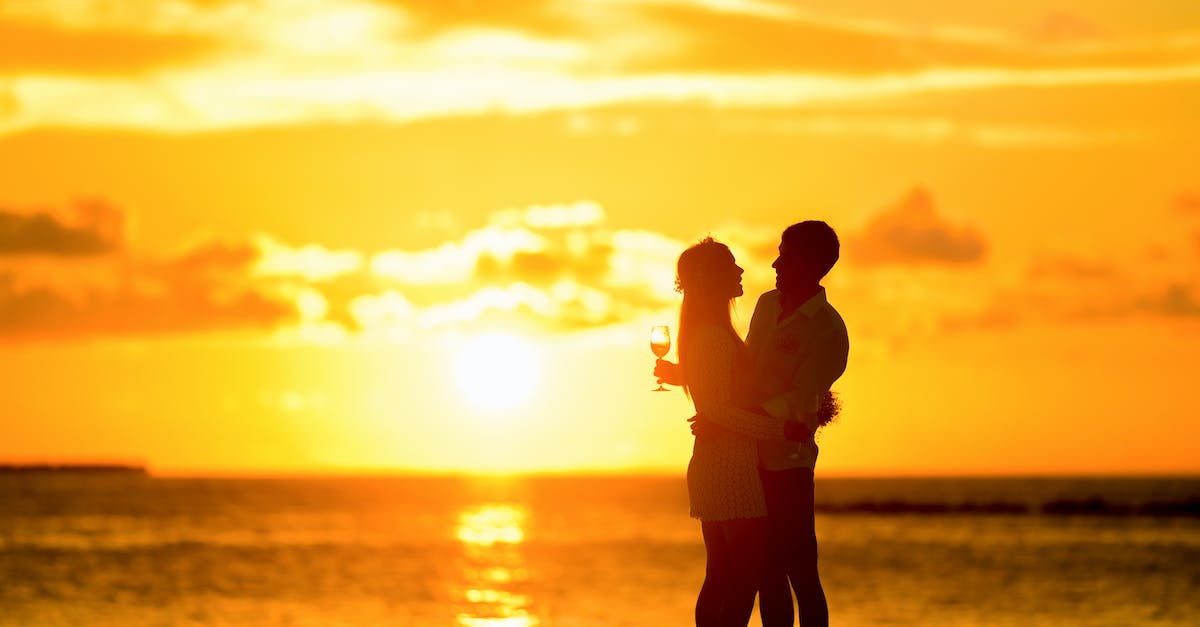 Are the Nimbus people related to any other cloud entities? - Silhouettes of romantic couple enjoying majestic sunset on seaside