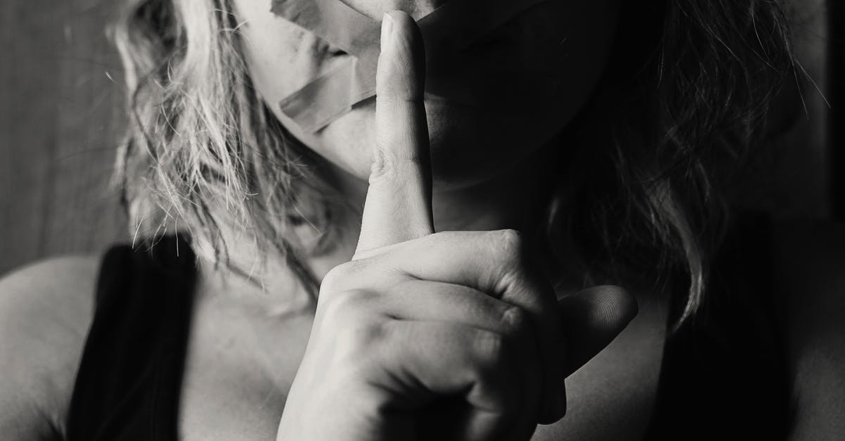 Are the secret factions based on the real world? - Woman Placing Her Finger Between Her Lips