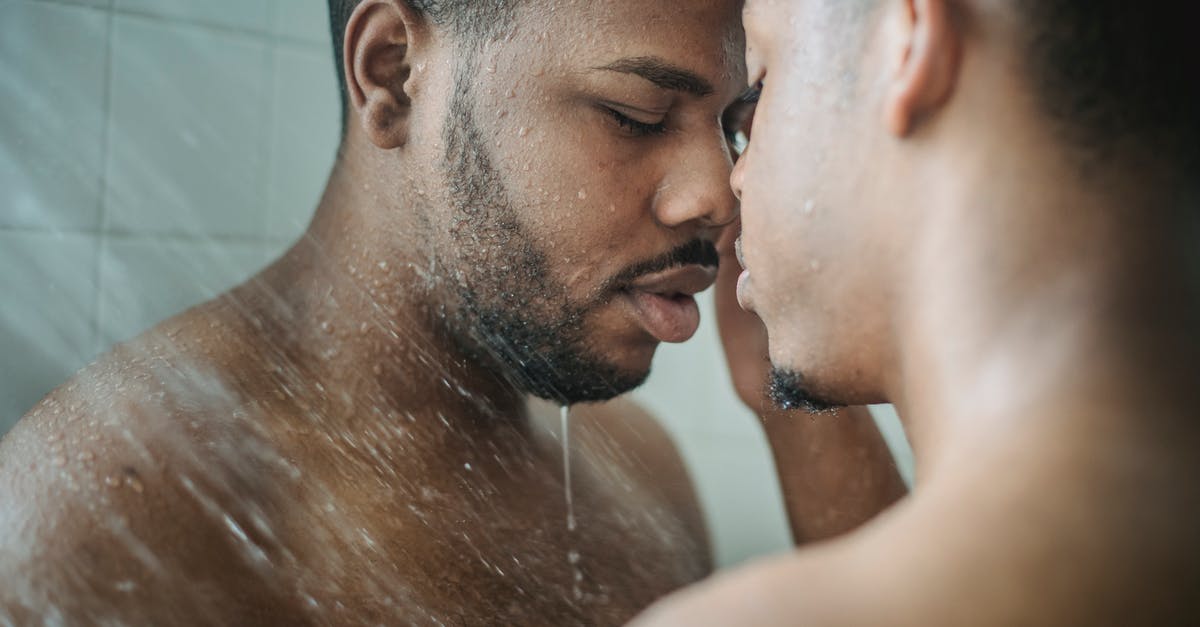 Are there advantages of having a Japanese vs an American 3DS? - Close-up of Men Having Shower Together