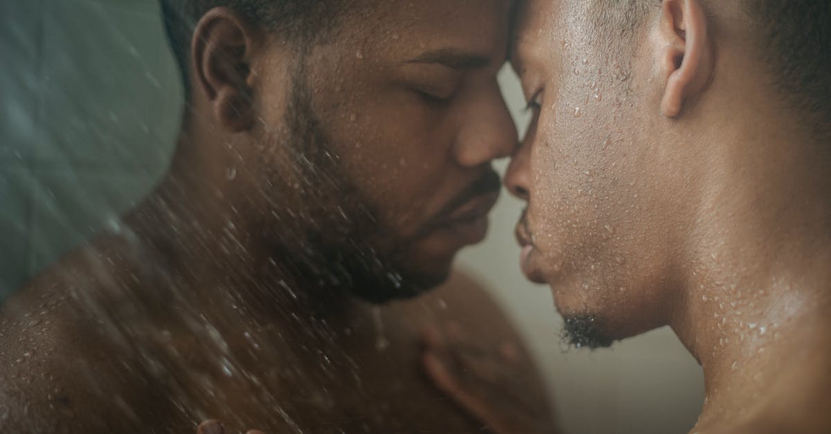 Are there advantages of having a Japanese vs an American 3DS? - Close-up of Men Having Shower Together