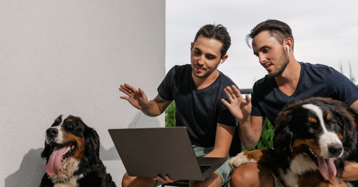 Are there animals in GTA Online? - Two Men Sitting while Waving Hello at the Laptop