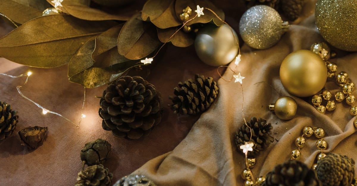 Are there any advantages to having an axe with silk touch? - Gold and Silver Baubles on Brown Textile