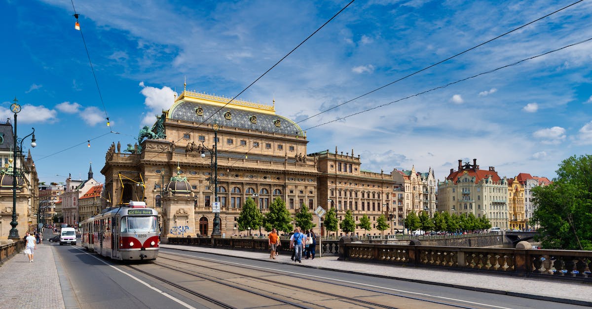 Are there any command-line arguments for Origin? - People Walking on Sidewalk Near Brown Concrete Building