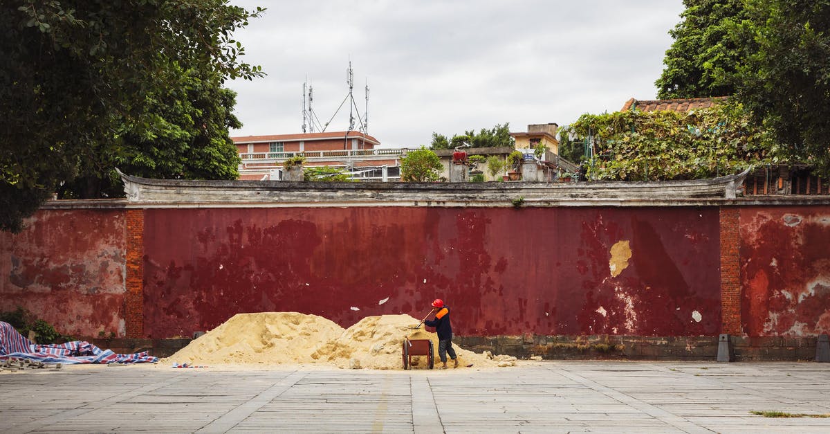 Are there any dangers in working outside in a storm? - Free stock photo of adult, architecture, bridge