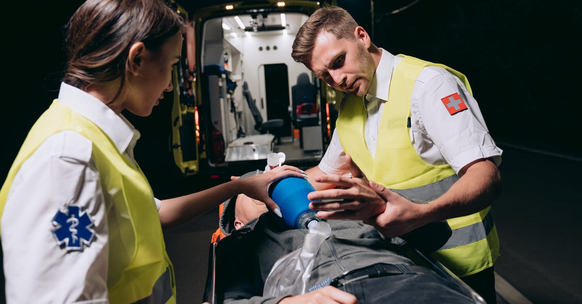 Are there any differences between the personality quizzes in Rescue Team DX and the original Rescue Team games? - Paramedics Giving First Aid to a Person Lying on a Stretcher