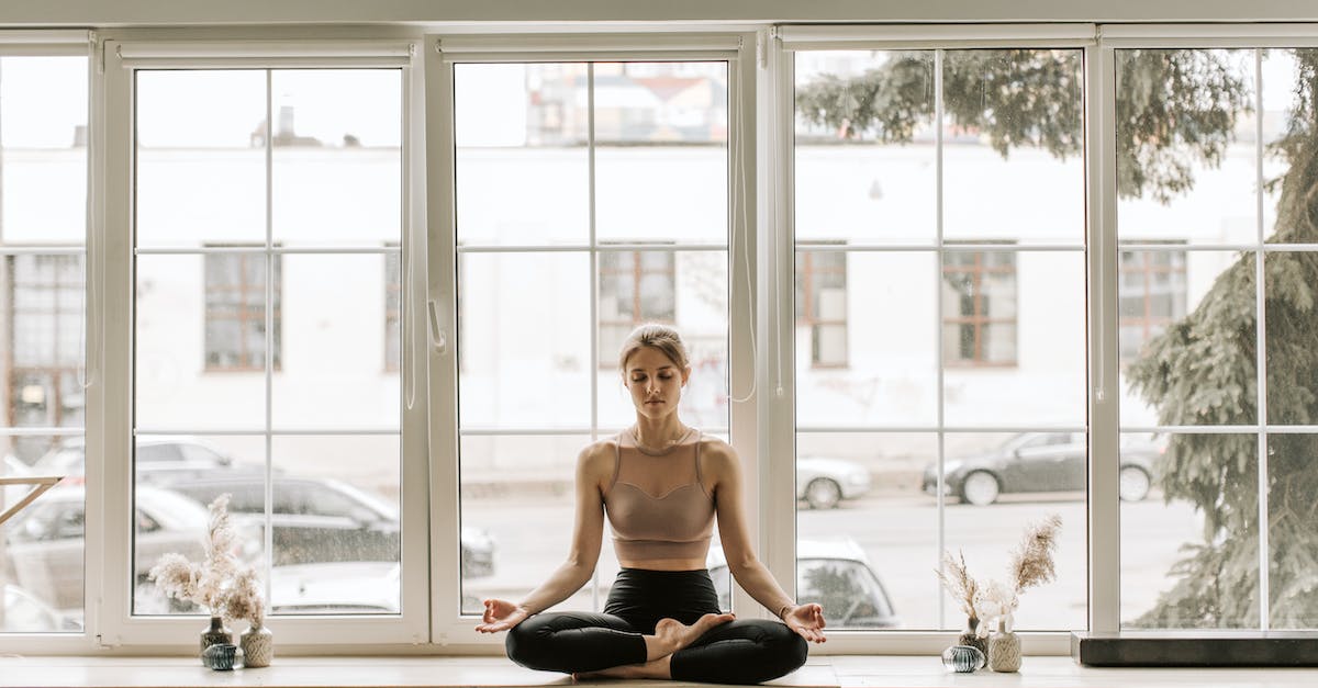 Are there any differences with longer duration of meditation? - Woman in Black Tube Top and Black Skirt Sitting on White Wooden Table Are there any differences with longer duration of meditation? - Woman in Black Tube Top and Black Skirt Sitting on White Wooden Table