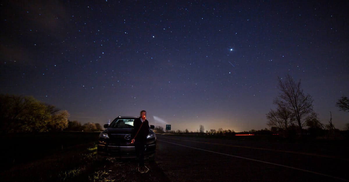 Are there any double, triple star systems in No Man's Sky? - Anonymous male standing near parked car while smoking cigarette under glowing starry sky above trees at sunset in dusk Are there any double, triple star systems in No Man's Sky? - Anonymous male standing near parked car while smoking cigarette under glowing starry sky above trees at sunset in dusk