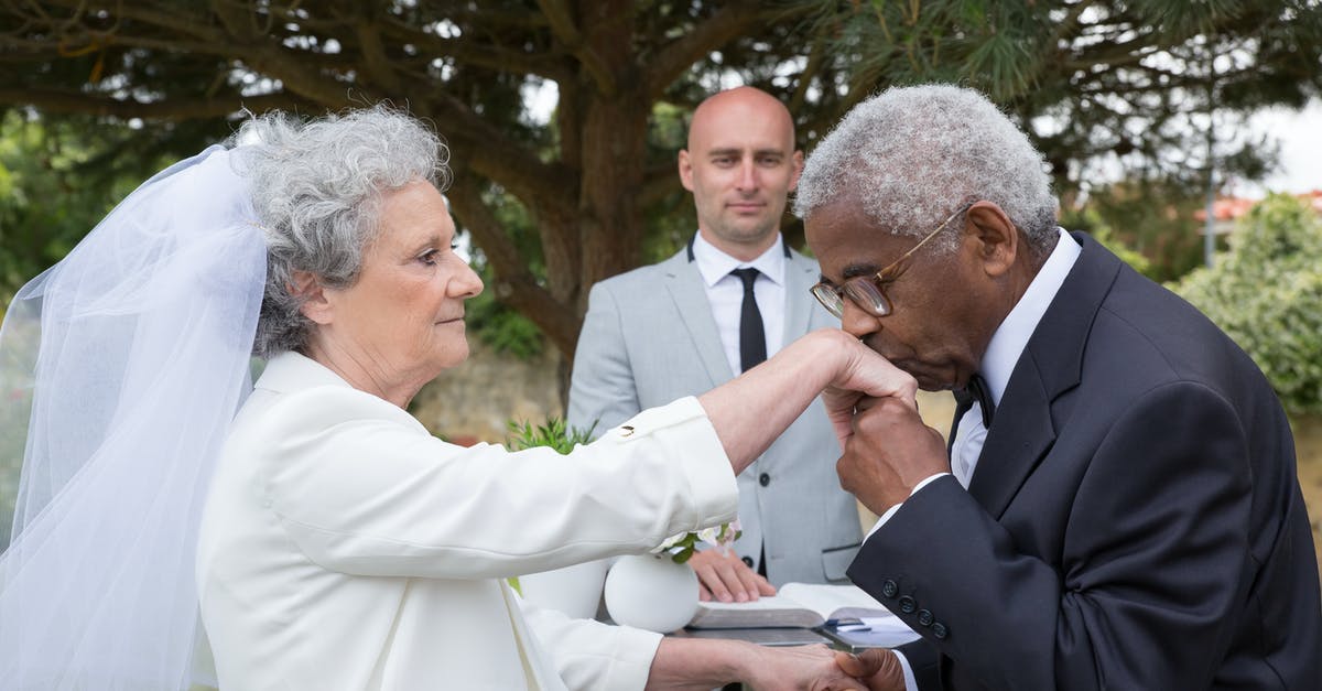 Are there any downsides to marriage? - Man in Black Suit Jacket Kissing Woman in White Dress