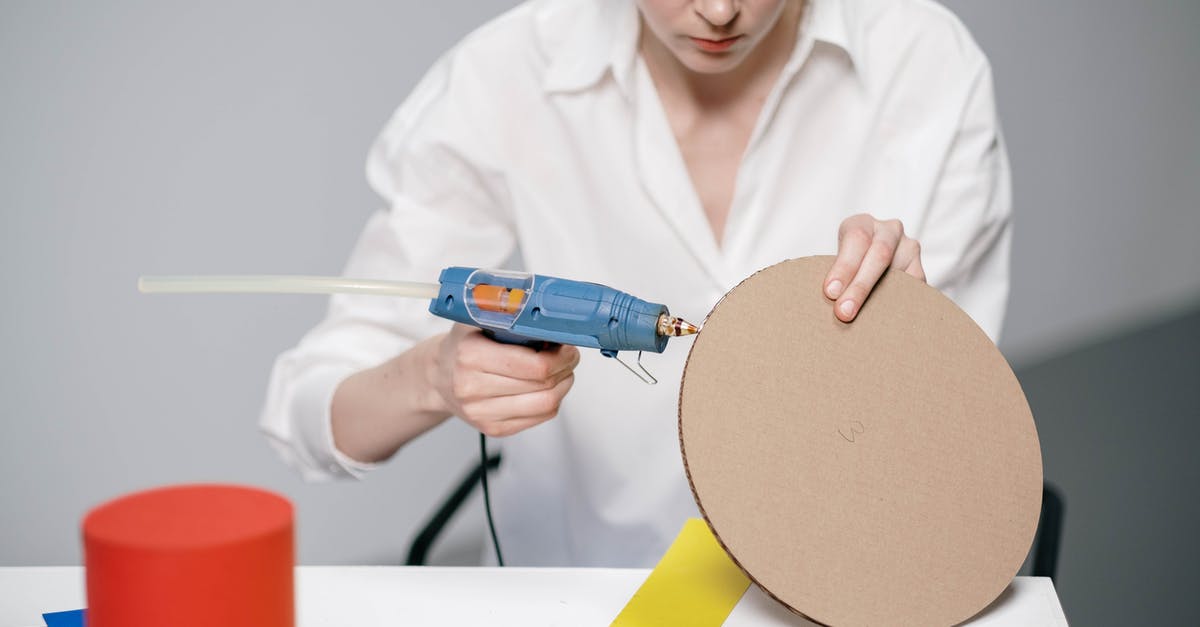 Are there any drawbacks to using explosions instead of guns? - A Woman Using a Glue Gun on Cardboard Are there any drawbacks to using explosions instead of guns? - A Woman Using a Glue Gun on Cardboard