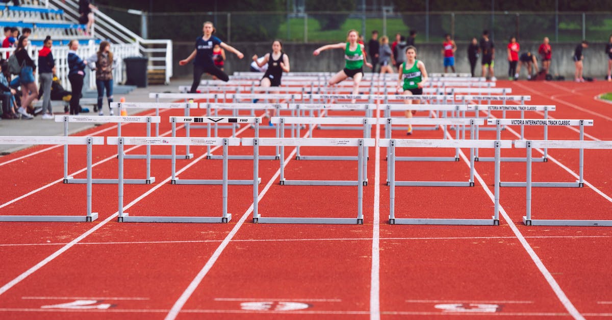 Are there any functions of collecting Lums when doing race challenges? - Shallow Focus Photo of People Playing Track and Field