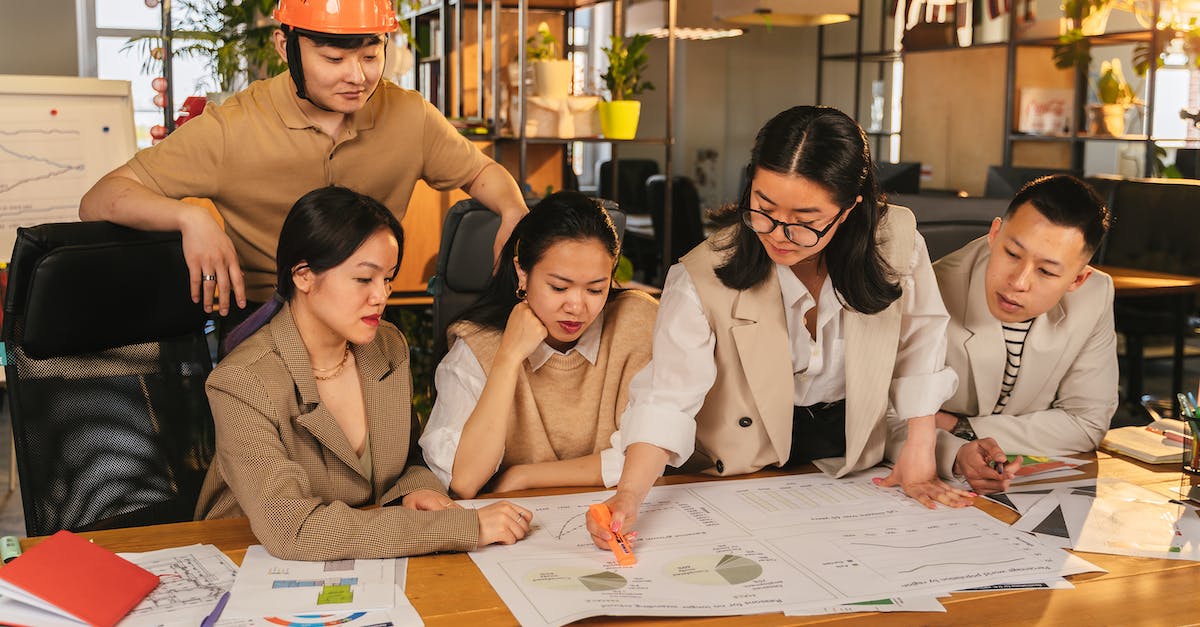 Are there any good Salarian Engineer Specs.? - Woman in Beige Coat Sitting Beside Woman in Beige Coat Are there any good Salarian Engineer Specs.? - Woman in Beige Coat Sitting Beside Woman in Beige Coat