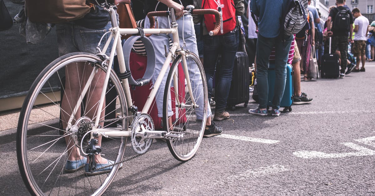 Are there any group queue restrictions in competitive? - Person in Black Sweater Hold a Grey Road Bike Are there any group queue restrictions in competitive? - Person in Black Sweater Hold a Grey Road Bike