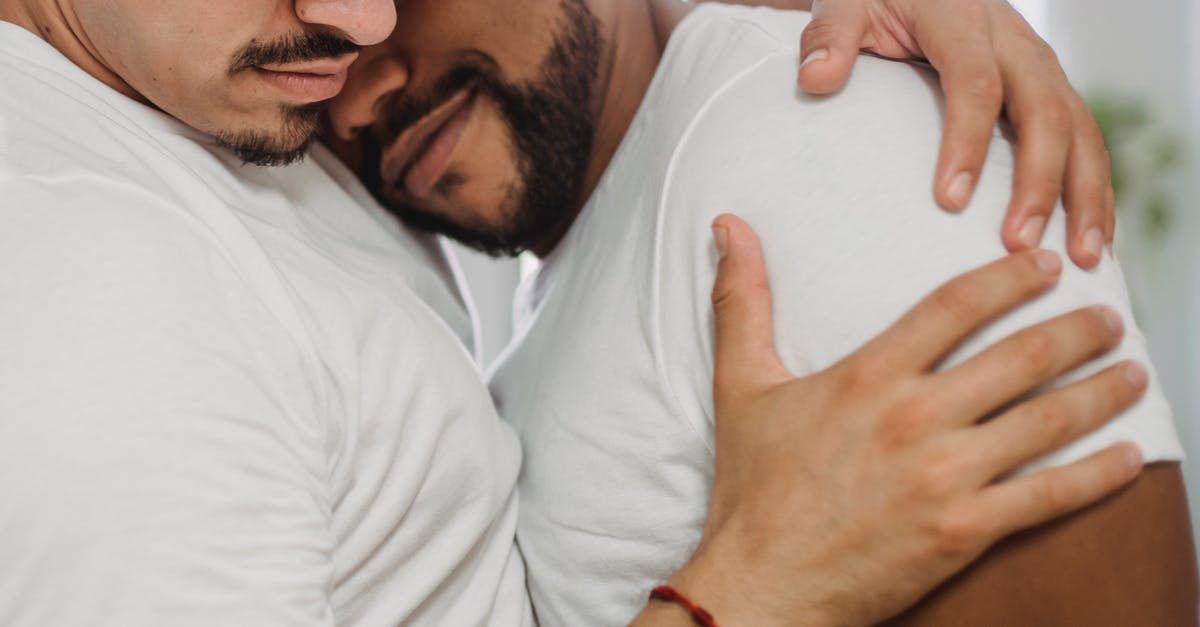 Are there any other Guardians? - Young Man Hugging Other Man Tenderly