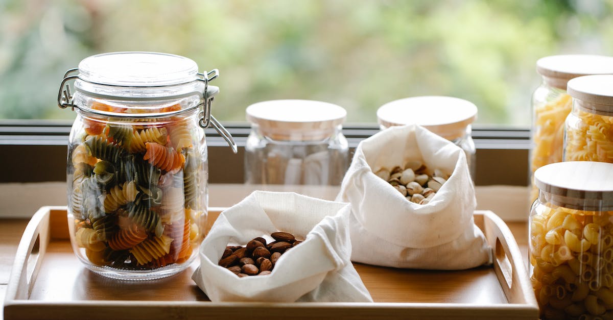 Are there any rewards for collecting all ampersands in Type Rider? - Glass jar with rotini pasta placed on wooden tray near ECO friendly bags with almonds and pistachios in light room near window on blurred background