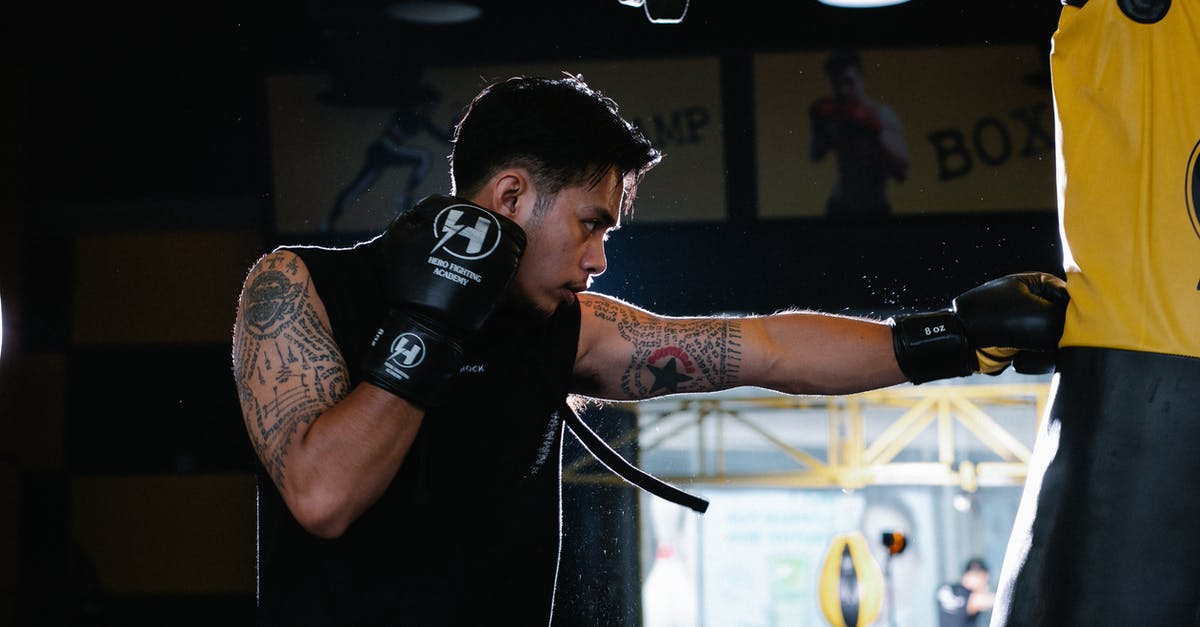 Are there critical hit attacks? - Athlete hitting heavy bag while practicing box