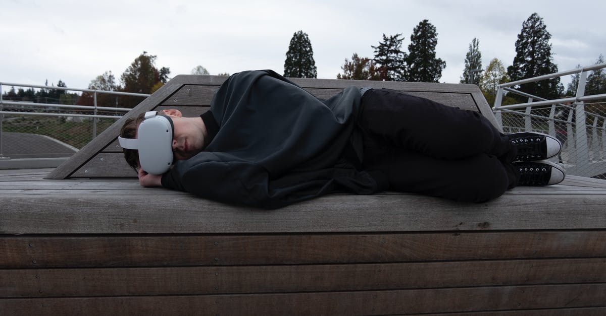 Are there missable quests in Another Eden? - A Man Lying Down while Wearing Virtual Reality Goggles