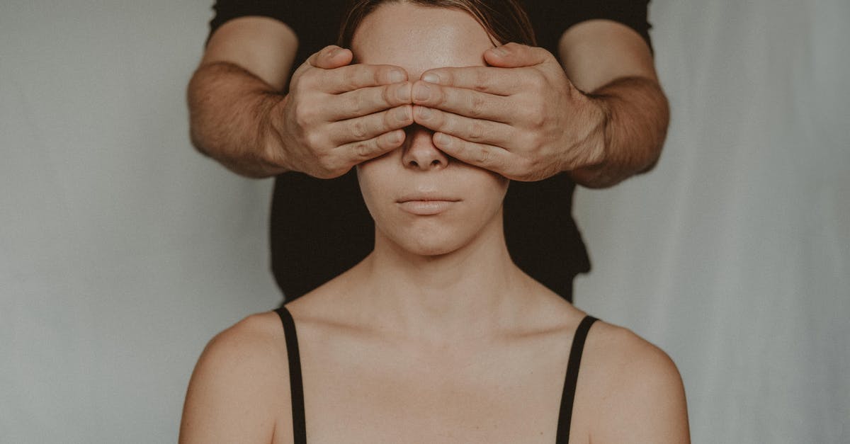 Are there Secret Rooms in Greed Mode? - Crop man covering eyes of anonymous woman