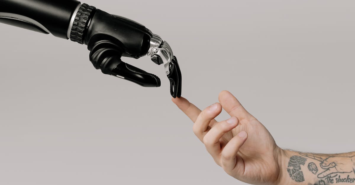 Are there supposed to be bionic addicts in The Den? - Bionic Hand and Human Hand Finger Pointing Are there supposed to be bionic addicts in The Den? - Bionic Hand and Human Hand Finger Pointing