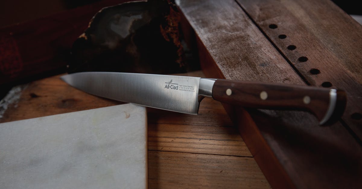 Are there trade-offs to blunt vs sharp weapons? - Brown Handle Knife on Brown Wooden Table