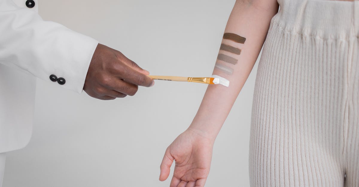Are there two different huntling courier skins? - Black man painting stripes on hand of woman Are there two different huntling courier skins? - Black man painting stripes on hand of woman