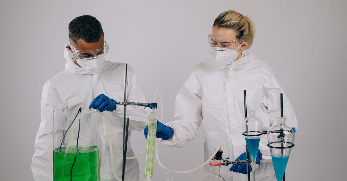 Are there women without glasses? - Man in White Dress Shirt Holding Clear Glass Bottle Are there women without glasses? - Man in White Dress Shirt Holding Clear Glass Bottle