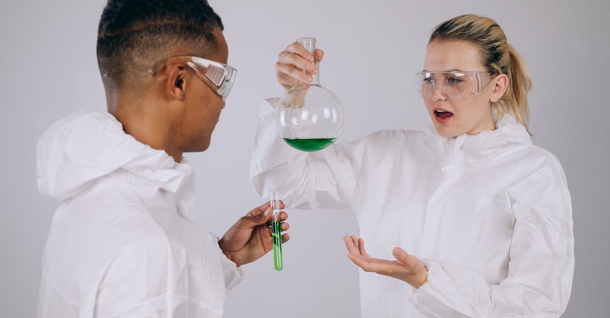 Are there women without glasses? - Man in White Dress Shirt Holding Green and White Plastic Container Are there women without glasses? - Man in White Dress Shirt Holding Green and White Plastic Container