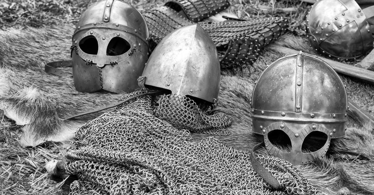 Armor enchantment on a held item 1.14 - Grayscale Photography of Chainmails and Helmets on Ground