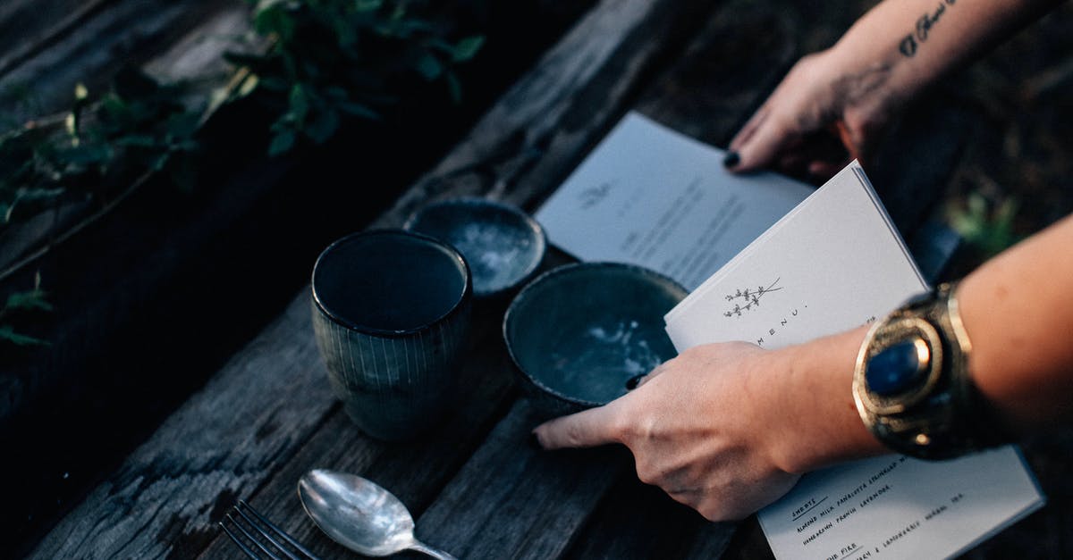 Armor Stand name is set but not detected by /testfor - From above crop anonymous female serving ceramic dinnerware and cutlery on weathered plank table in summer forest