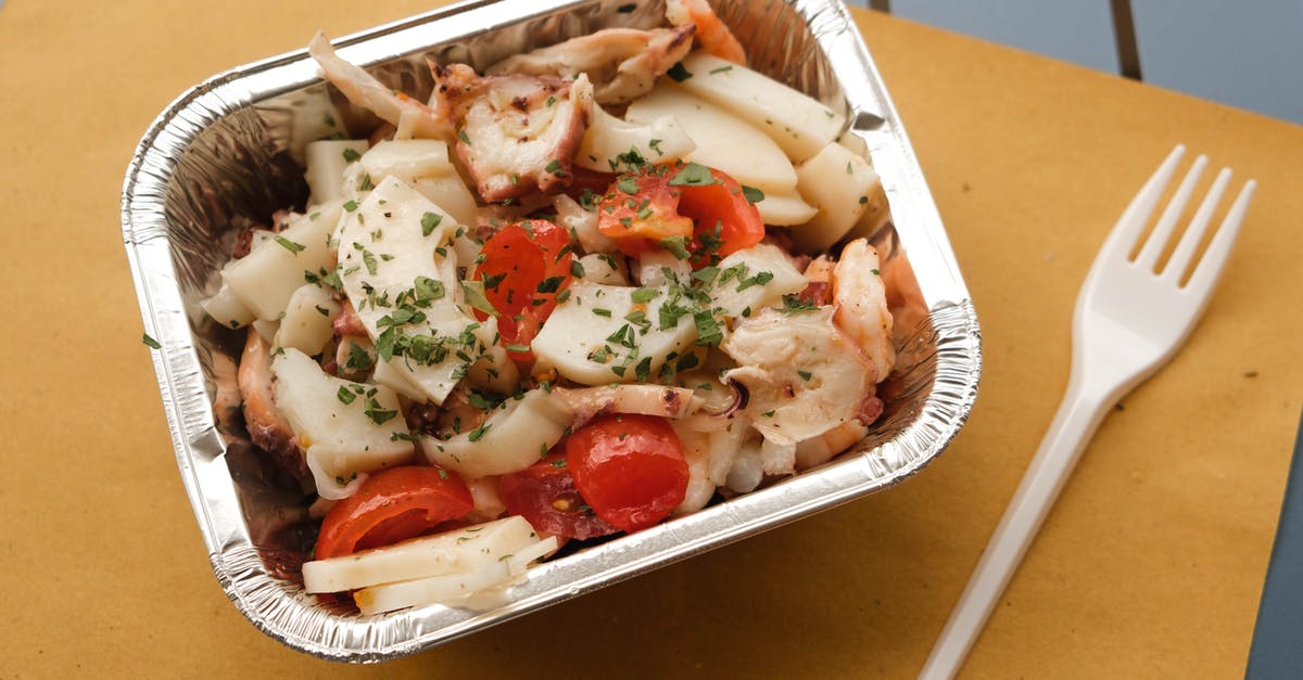 ArmorStand Passenger on Squid sinks away from Squid - From above of delicious meal with squids and vegetables under herbs on table
