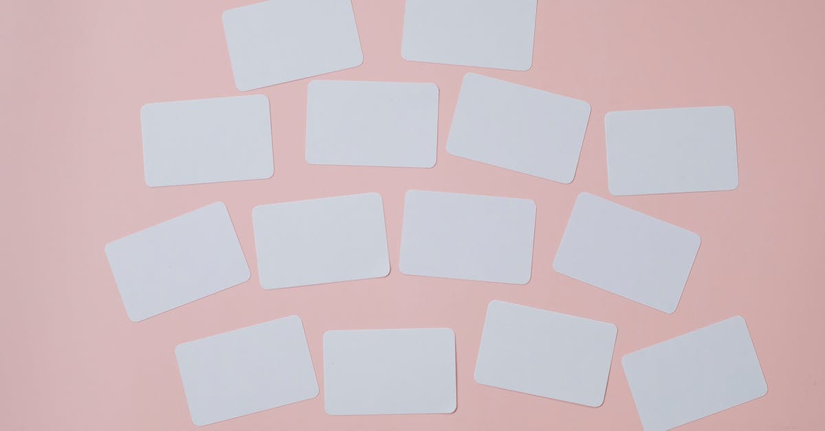 Artifacts List page is blank - Set of empty white papers attached on pink wall Artifacts List page is blank - Set of empty white papers attached on pink wall