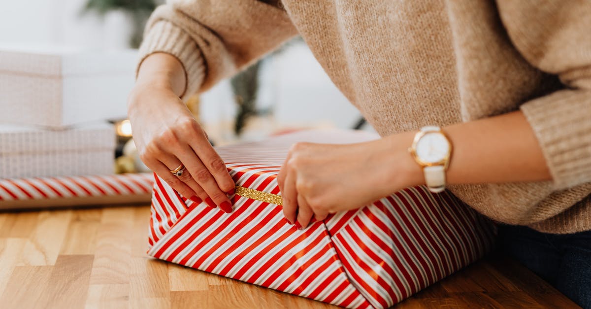 Asking for a gift - Hands Closing Gift Box