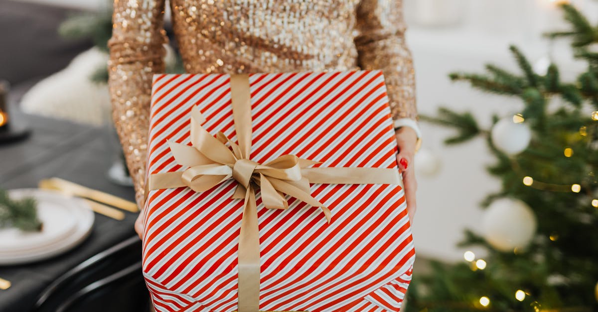 Asking for a gift - Woman in Brown Long Sleeve Shirt and Red and White Striped Skirt