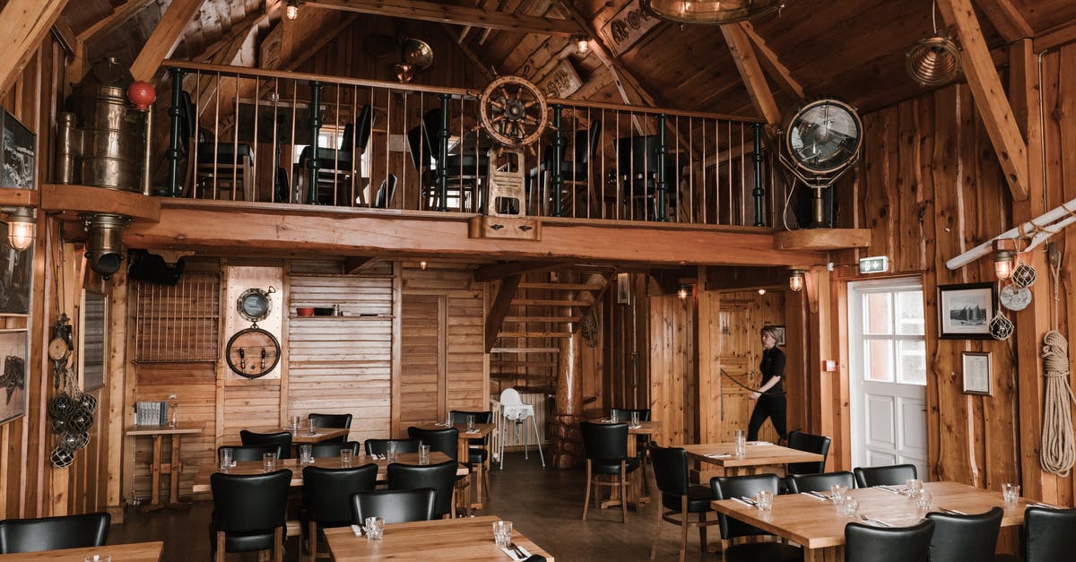 At what kind of places will my ship scanned for contraband? - Interior of wooden building of restaurant in style of sundeck