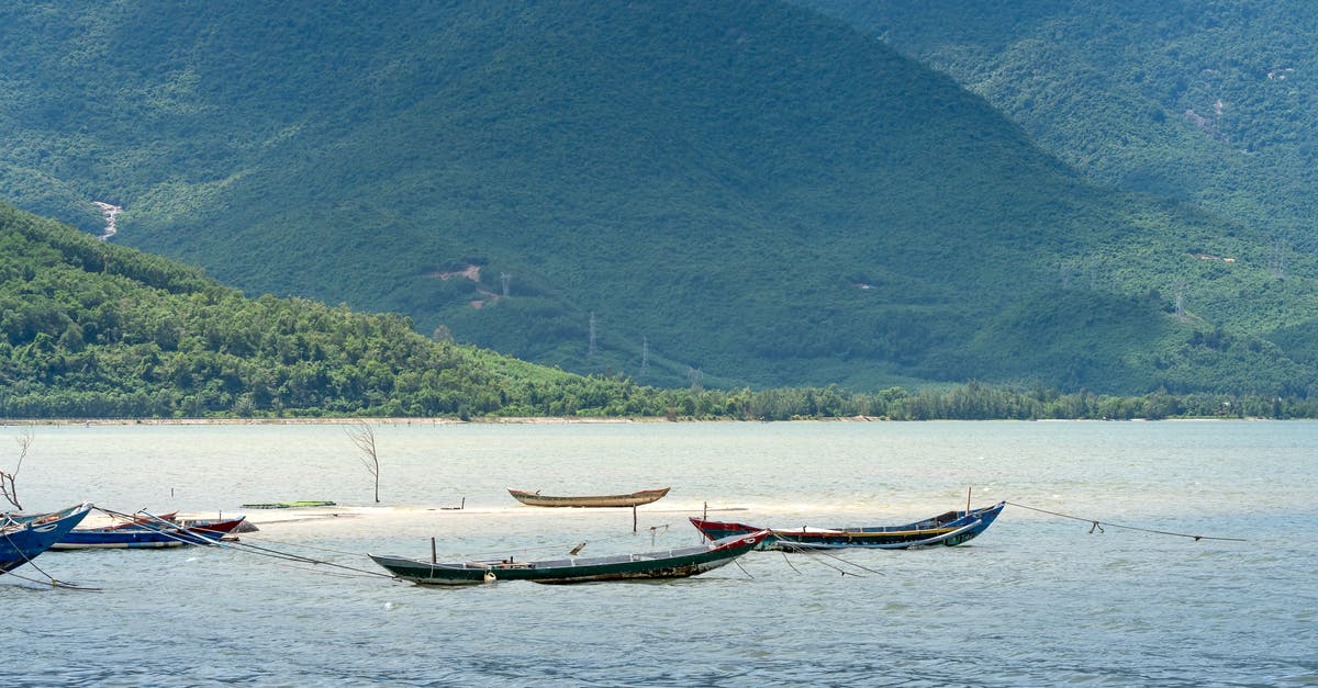 At what range do various weapons get range bonuses? - Various boats floating on rippling water surface of sea against hilly area covered with grass in nature on summer day At what range do various weapons get range bonuses? - Various boats floating on rippling water surface of sea against hilly area covered with grass in nature on summer day