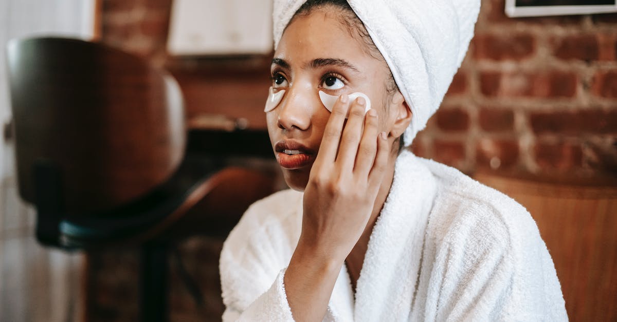 At what time do the dailies refresh in Skyforge? - Young African American female with towel on head applying eye patches on face while looking away At what time do the dailies refresh in Skyforge? - Young African American female with towel on head applying eye patches on face while looking away