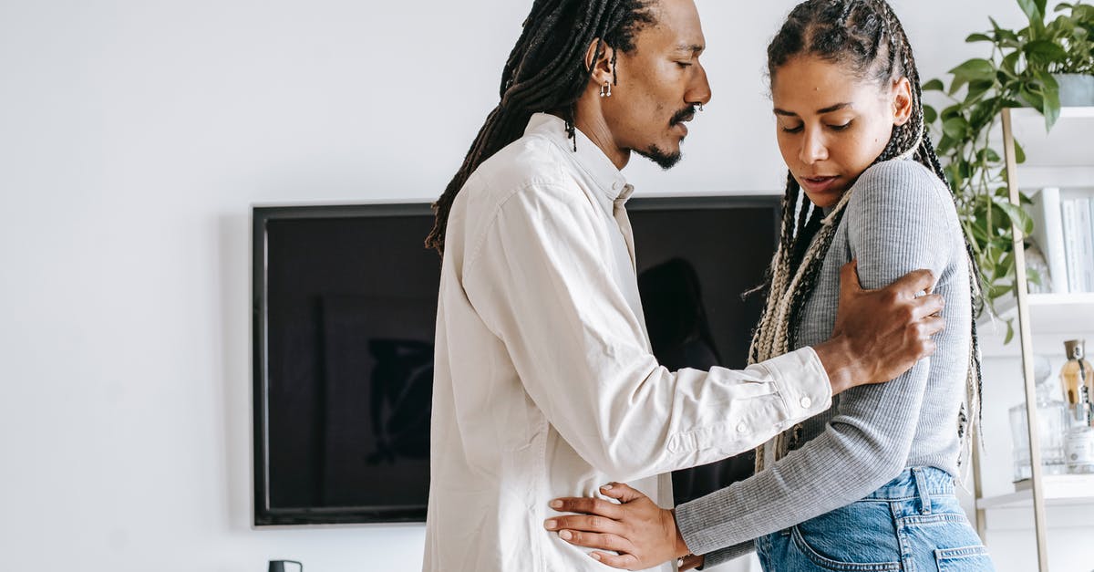 Audio Problems with Playstation 1 on Vizio TV - Young black male grabbing arms of wife during argument at home Audio Problems with Playstation 1 on Vizio TV - Young black male grabbing arms of wife during argument at home