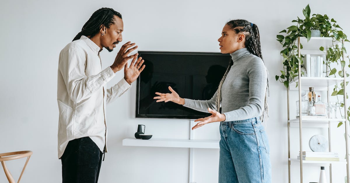 Audio Problems with Playstation 1 on Vizio TV - Annoyed young ethnic couple quarreling in cozy apartment Audio Problems with Playstation 1 on Vizio TV - Annoyed young ethnic couple quarreling in cozy apartment