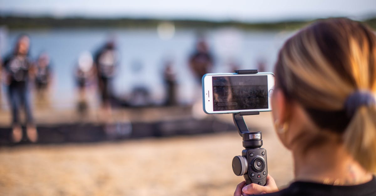 AV to HDMI 1080p Scaler Video Converter Outputting Sound But Not Video - Anonymous woman shooting performance on beach