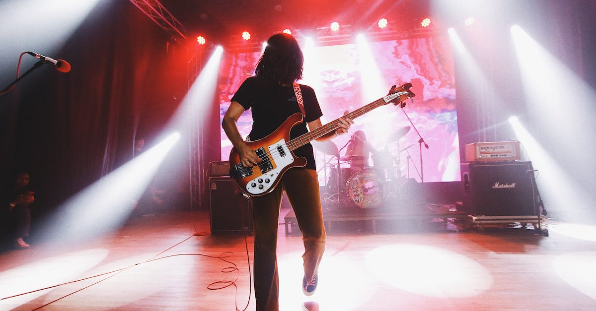 Average performance in ESO with my setup - A Man Playing the Electric Guitar on Stage