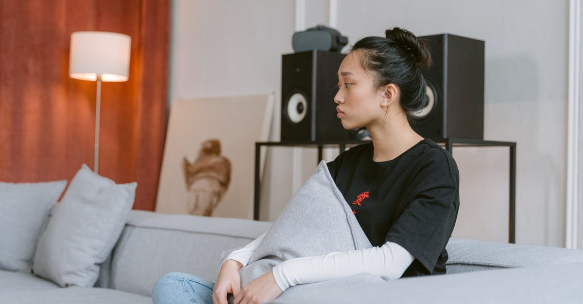 Barbie Pet Rescue PC game Windows 10 problem - Woman in Black Long Sleeve Shirt and Blue Denim Jeans Sitting on White Bed