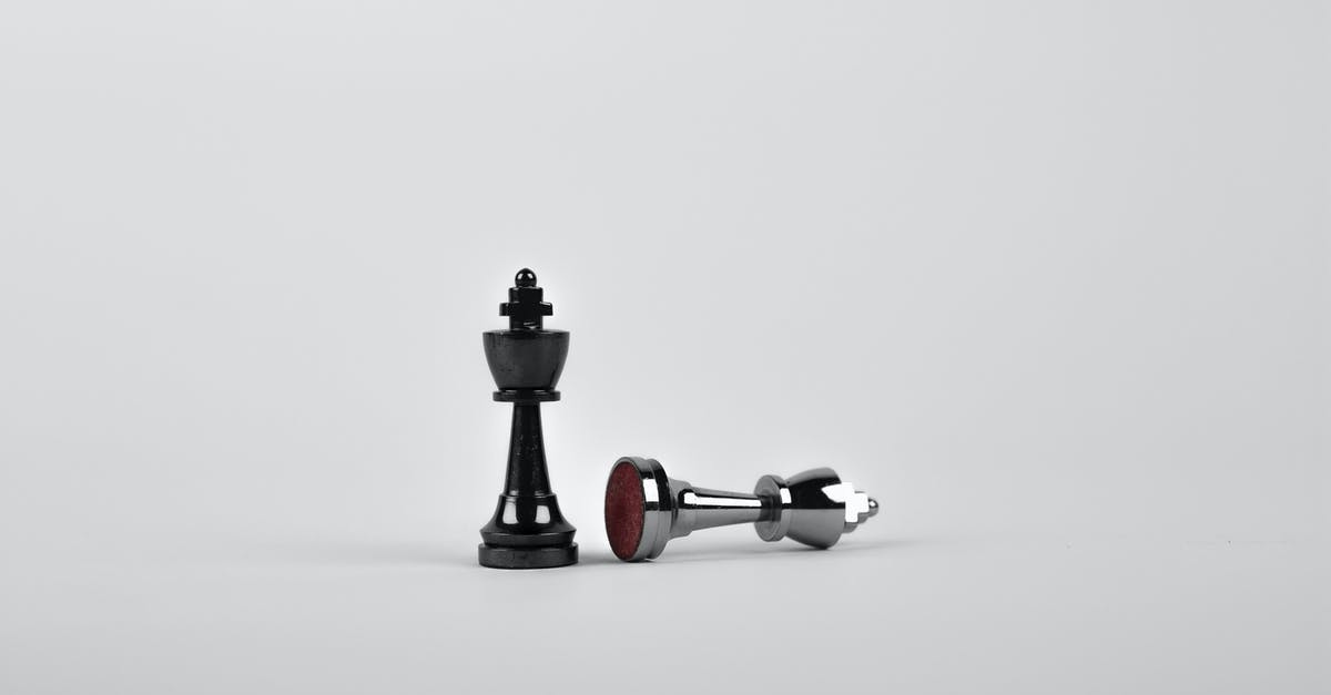 Battle my own Pokemon? [closed] - Two Silver Chess Pieces on White Surface