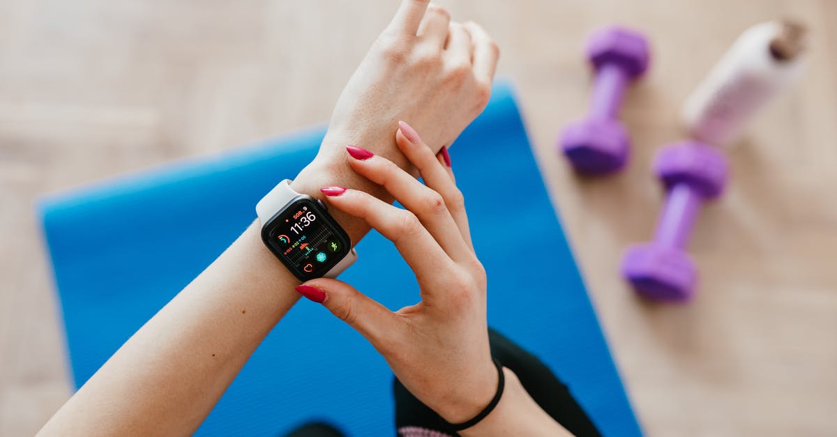 Battle.net / Steam: Physical copy allowing use of digital download? - Anonymous sportswoman checking smart watch and sitting on mat Battle.net / Steam: Physical copy allowing use of digital download? - Anonymous sportswoman checking smart watch and sitting on mat