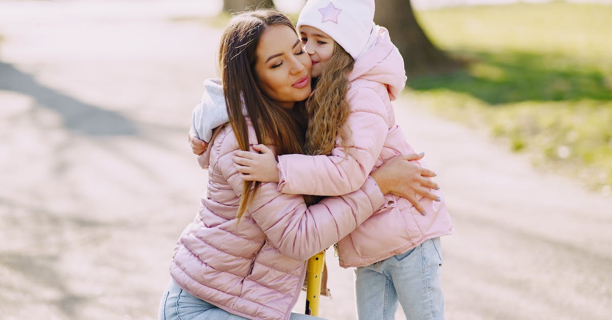 Being the only support , should I ward top and bot lanes at the same time? - Girl kissing and hugging mom in park