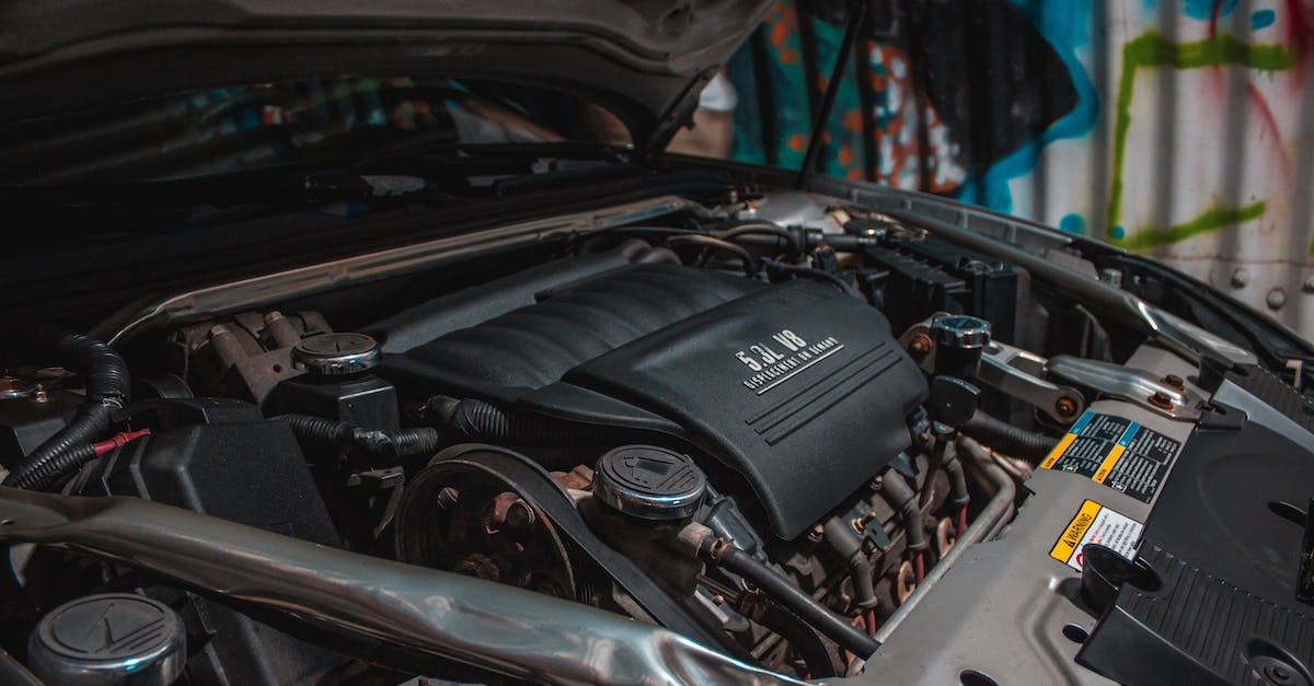 Better Information On Defense Damage Clash of Clans - Internal combustion engine and other components of mechanism of expensive luxury sports car parked next to wall decorated with graffiti