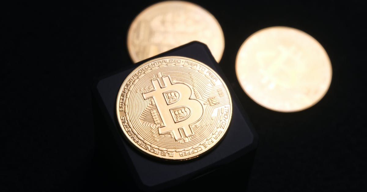 Better way to make money - Gold Round Coin on Black Box Better way to make money - Gold Round Coin on Black Box
