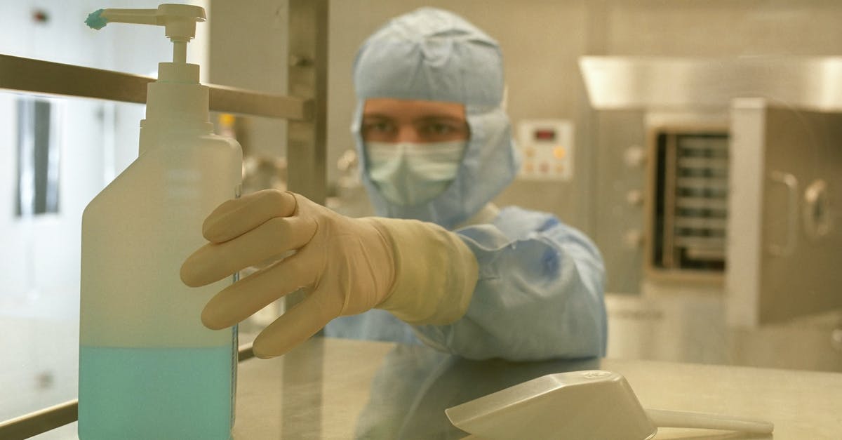 Bind for taking out melee wep in TF2? - Man in a Disposable Medical Uniform Reaching Out a Container with Liquid Bind for taking out melee wep in TF2? - Man in a Disposable Medical Uniform Reaching Out a Container with Liquid