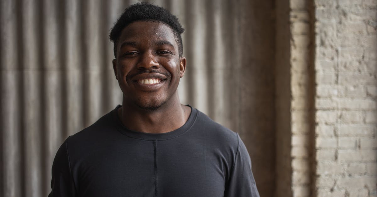 Black Ops 1 and Modern Warfare 2 aren't saving multiplayer progress? - Content adult black male athlete looking at camera with toothy smile against ribbed wall