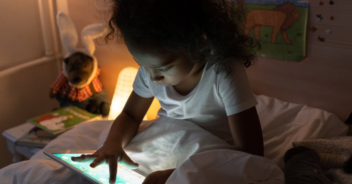 Black screen reboot when playing certain games - A Young Girl Using Her Tablet Black screen reboot when playing certain games - A Young Girl Using Her Tablet