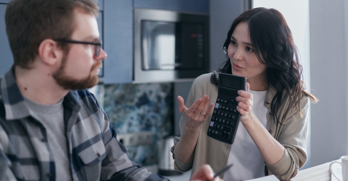 Blockdata Problems [duplicate] - Man in Black and White Plaid Dress Shirt Holding Black Smartphone