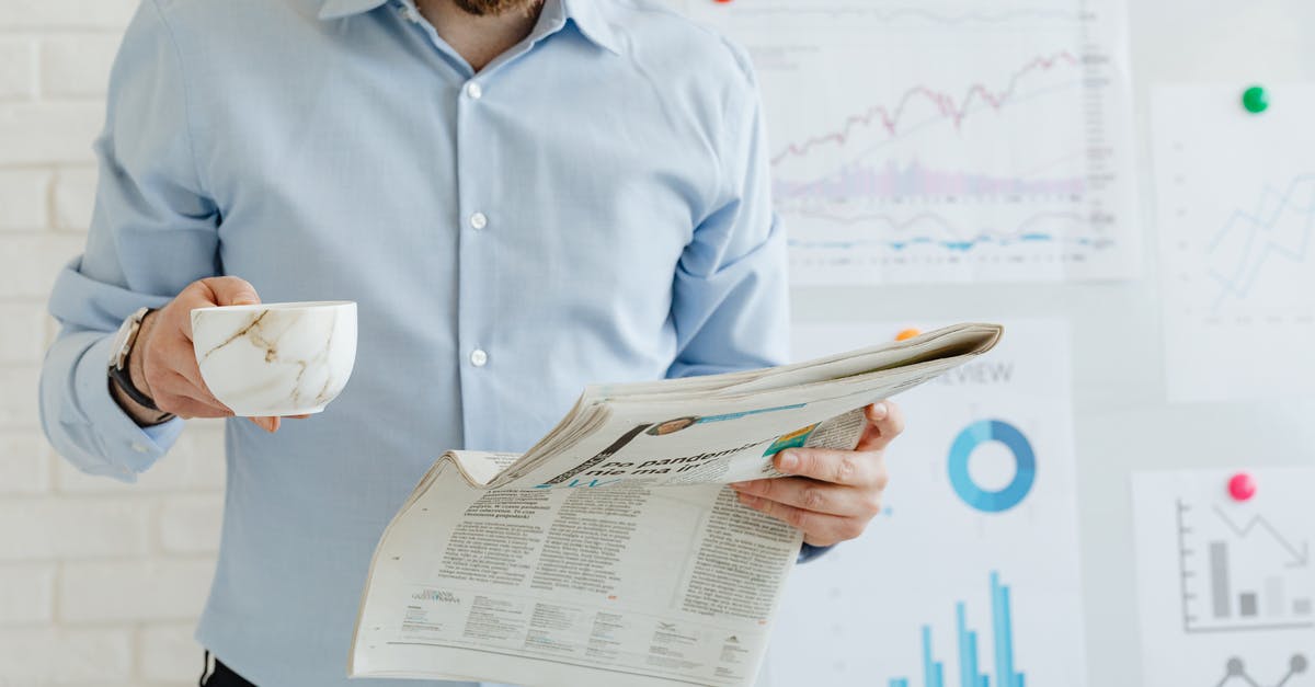 Borderlands 2 drop/quest rewards at non-max levels - Man in Blue Dress Shirt Reading Newspaper